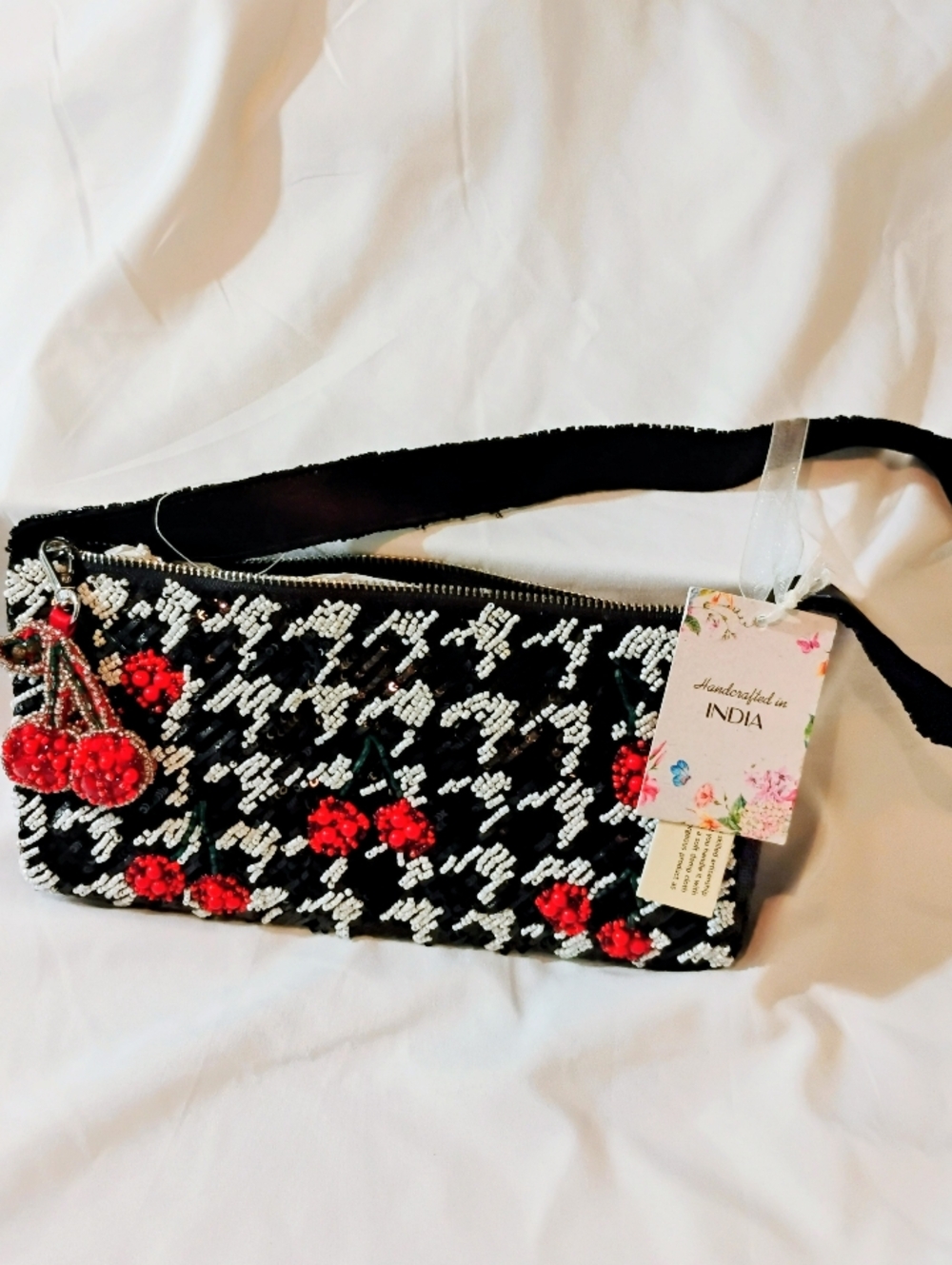 Handcrafted Black and White Beaded Bag with Red Accents